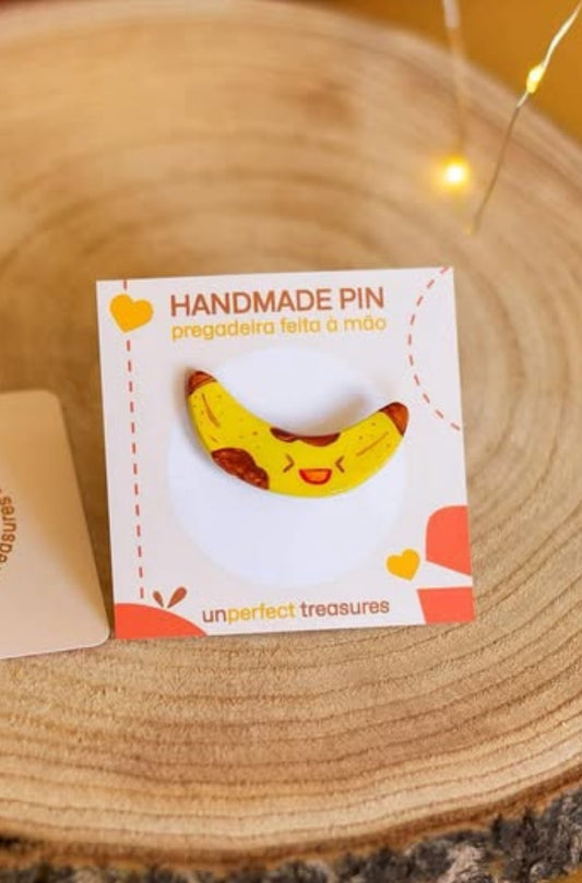 Pregadeira de peito feita à mão